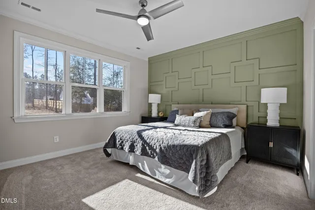 a bathroom with double sink and a mirror