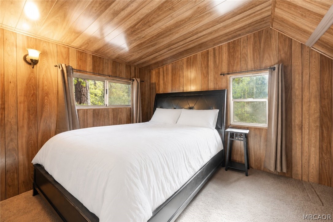 773 Sunset Lane Sugarloaf, CA 92386 - Photo 16 of 33 a bedroom with a bed and a window