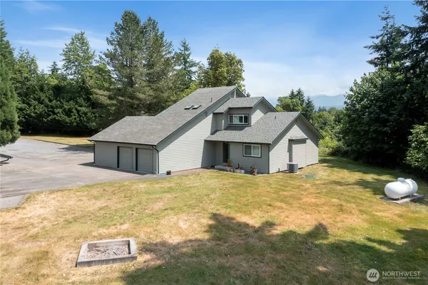 a view of a house with a ocean view