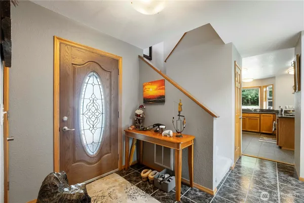 a workspace with furniture and window