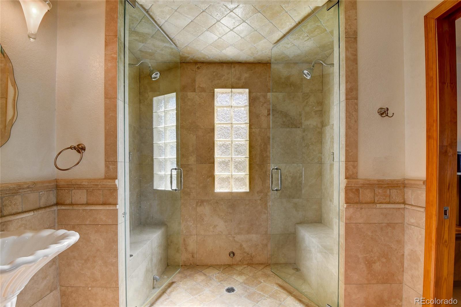 33633 Elk Run Evergreen, CO 80439 - Photo 21 of 40 a bathroom with a shower