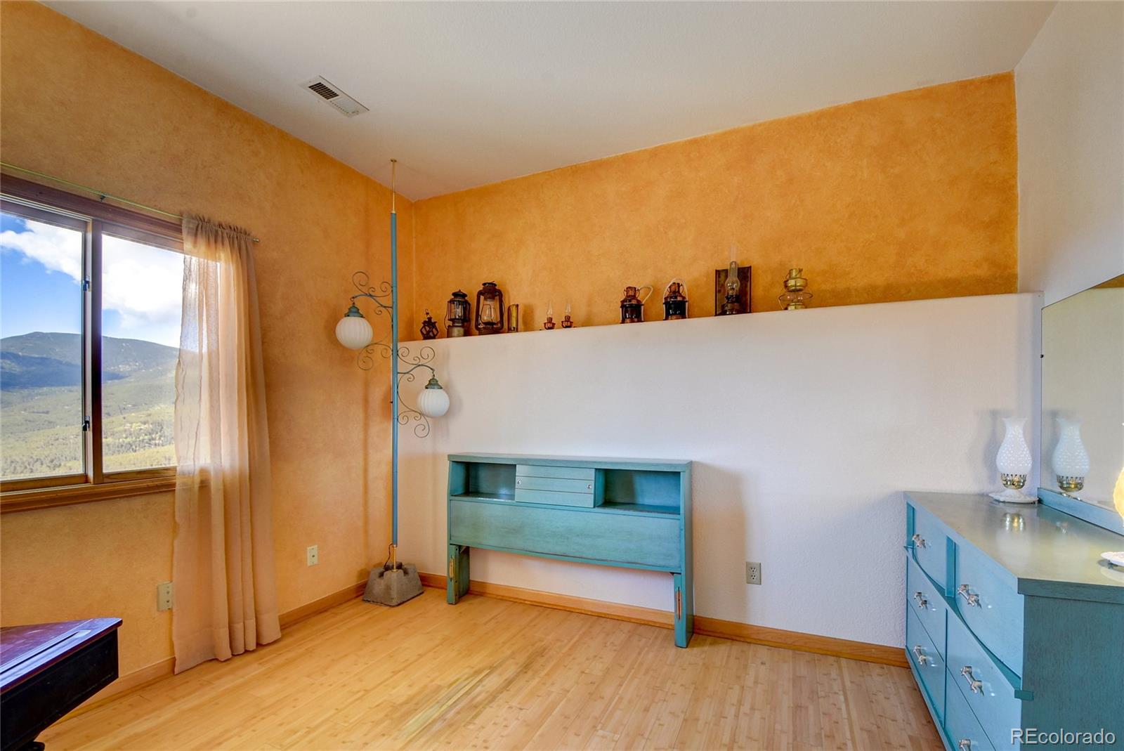 33633 Elk Run Evergreen, CO 80439 - Photo 31 of 40 a view of a room with wooden floor and cabinet
