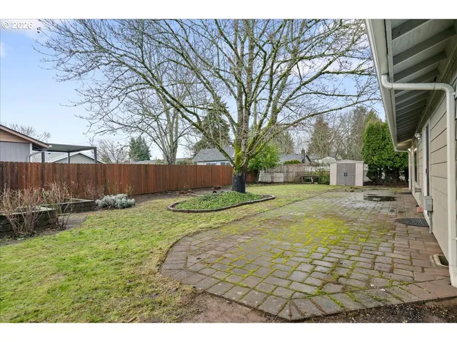 a backyard of a house with lots of green space