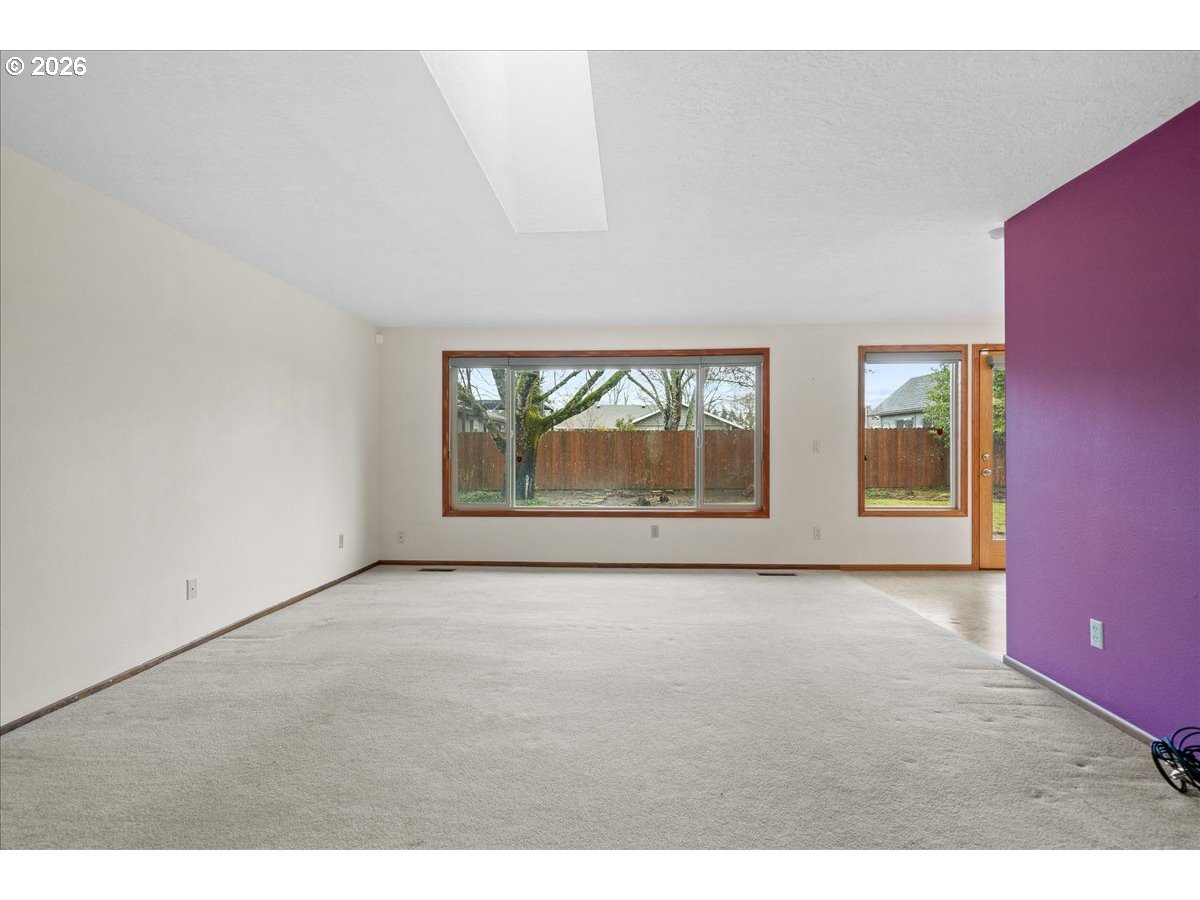 997 Julie Street North Keizer, OR 97303 - Photo 6 of 30 an empty room with windows