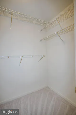 a view of a room with racks on the wall