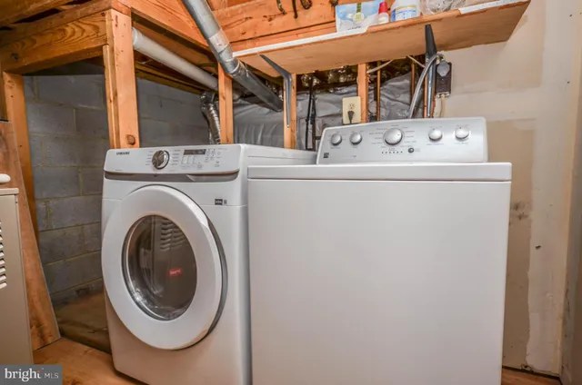a utility room with dryer and washer