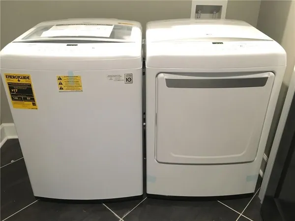 a utility room with dryer and washer