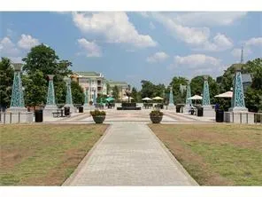 a view of a swimming pool and a outdoor seating
