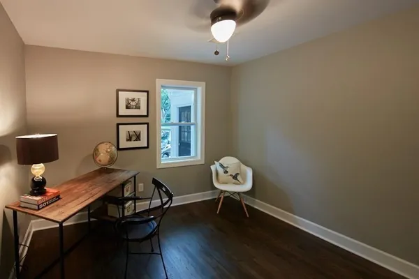 a view of a workspace with furniture