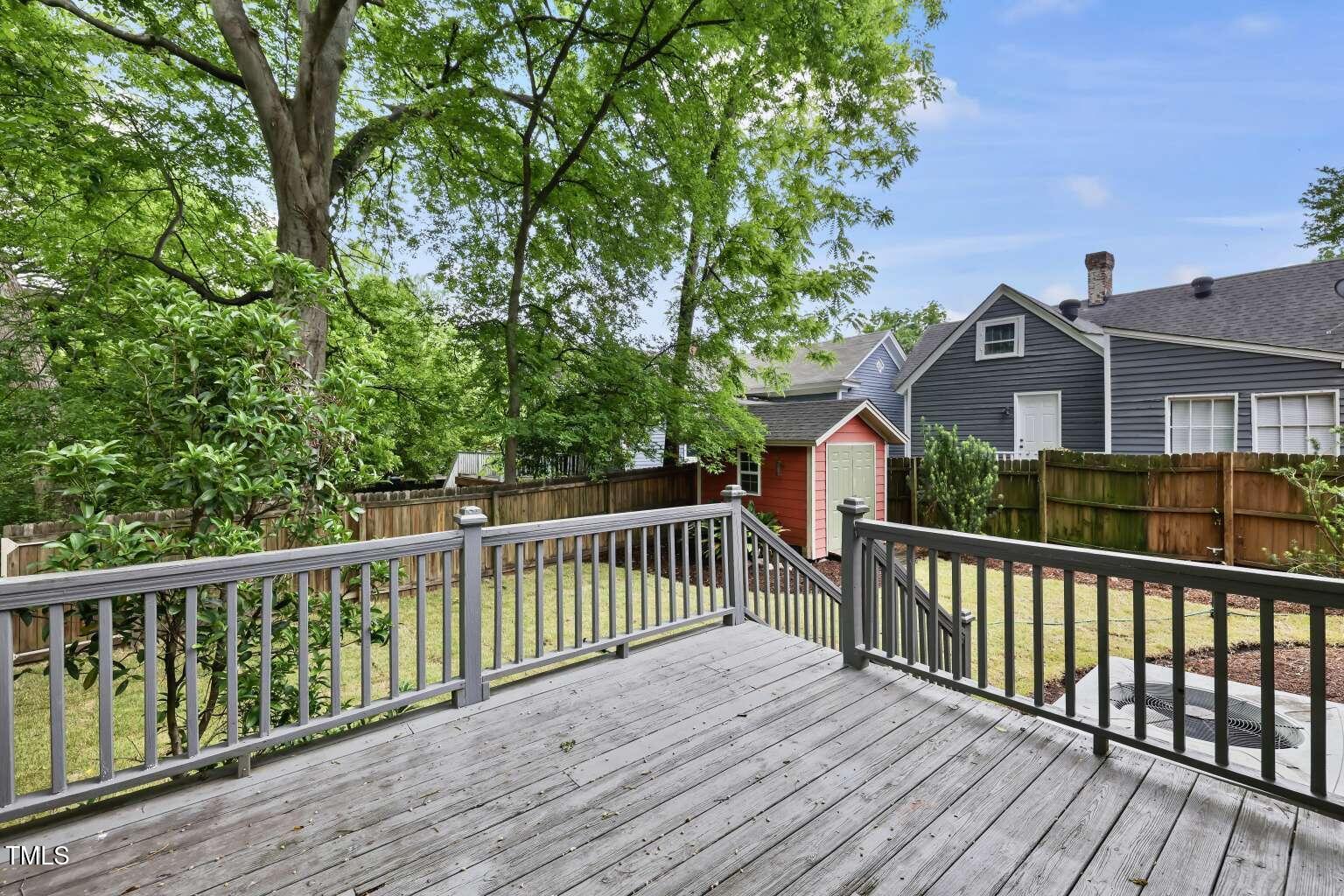 304 Linden Avenue Raleigh, NC 27601 - Photo 11 of 33 a view of a wooden roof deck