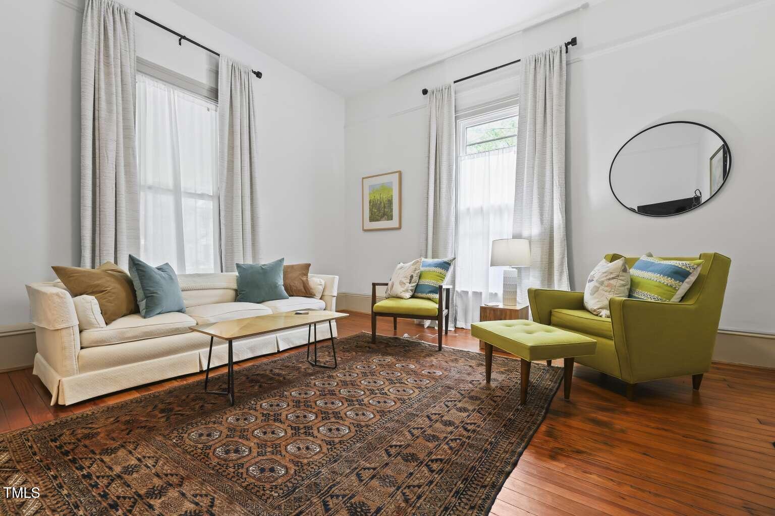 304 Linden Avenue Raleigh, NC 27601 - Photo 19 of 33 a living room with furniture and a window