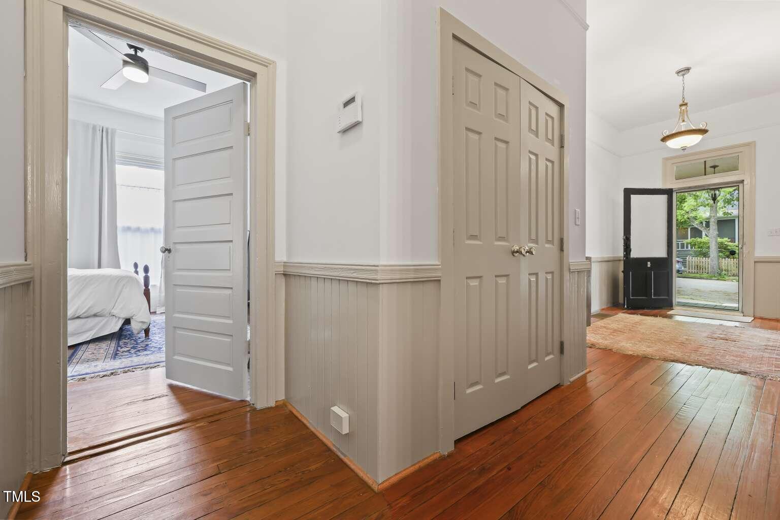 304 Linden Avenue Raleigh, NC 27601 - Photo 23 of 33 a view of a hallway with wooden floor and closet