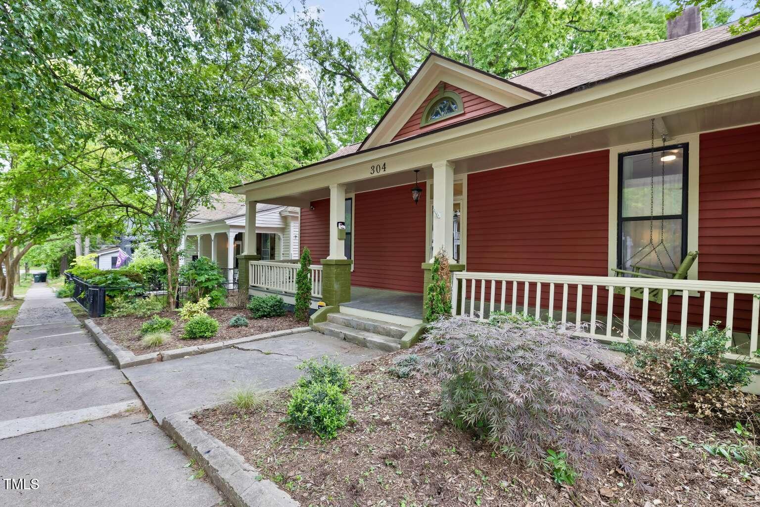 304 Linden Avenue Raleigh, NC 27601 - Photo 2 of 33 a porch with seating space