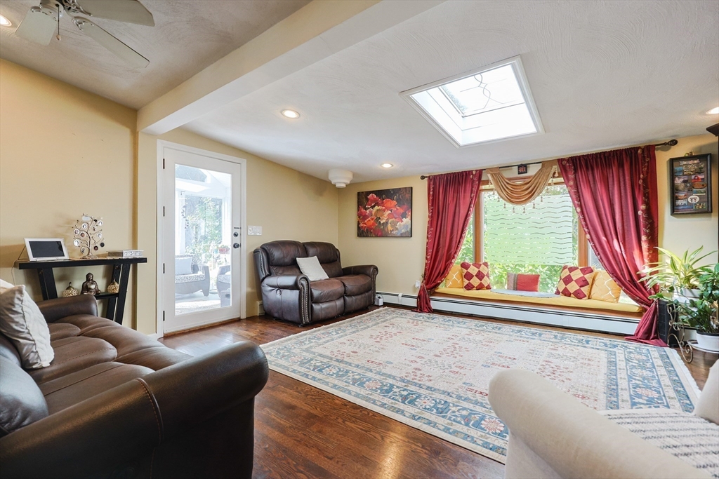 2 Rhodes Avenue Sharon, MA 02067 - Photo 15 of 42 a living room with furniture and a large window