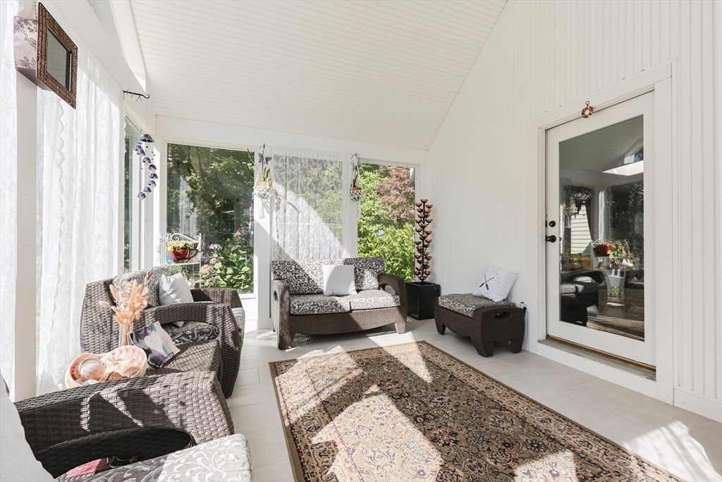 2 Rhodes Avenue Sharon, MA 02067 - Photo 20 of 42 a living room with furniture and a large window