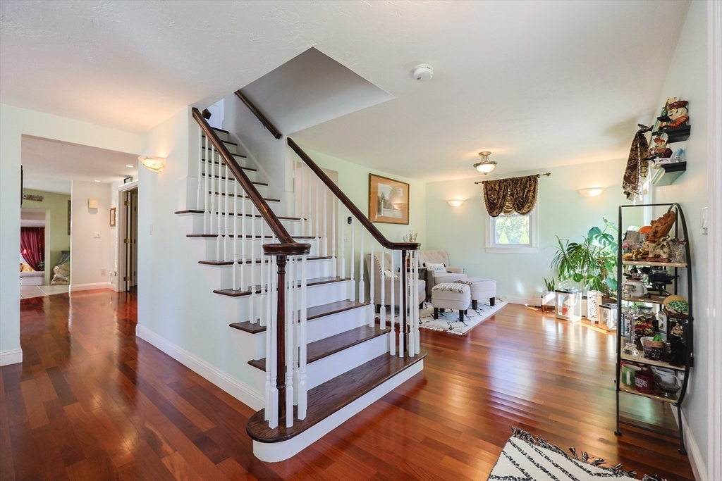 2 Rhodes Avenue Sharon, MA 02067 - Photo 22 of 42 a view of entryway and hall with wooden floor