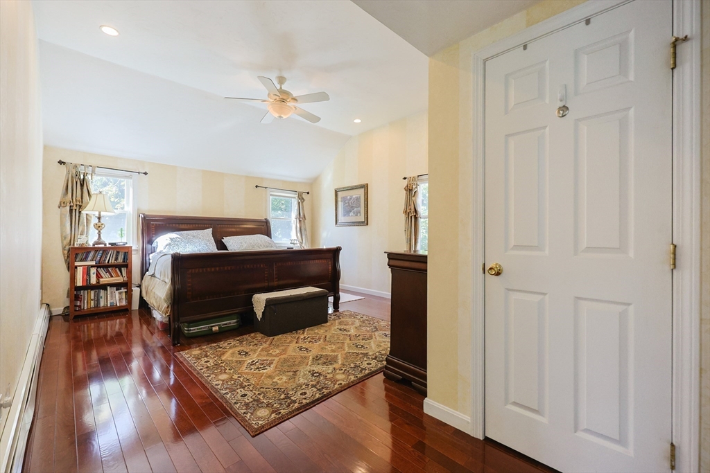 2 Rhodes Avenue Sharon, MA 02067 - Photo 23 of 42 a bedroom with furniture and wooden floor