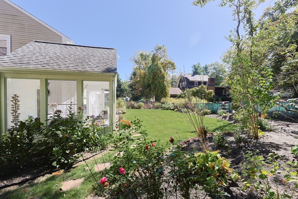 2 Rhodes Avenue Sharon, MA 02067 - Photo 36 of 42 a view of a house with a garden