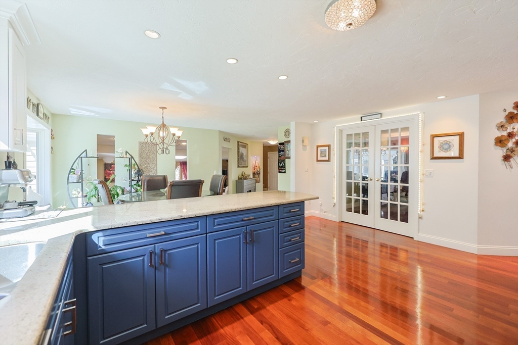2 Rhodes Avenue Sharon, MA 02067 - Photo 7 of 42 a spacious bathroom with a sink and a large mirror