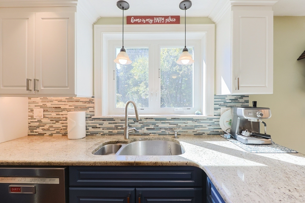 2 Rhodes Avenue Sharon, MA 02067 - Photo 9 of 42 a kitchen with sink and window