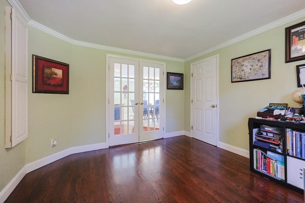 2 Rhodes Avenue Sharon, MA 02067 - Photo 10 of 42 a view of an empty room with wooden floor and a window