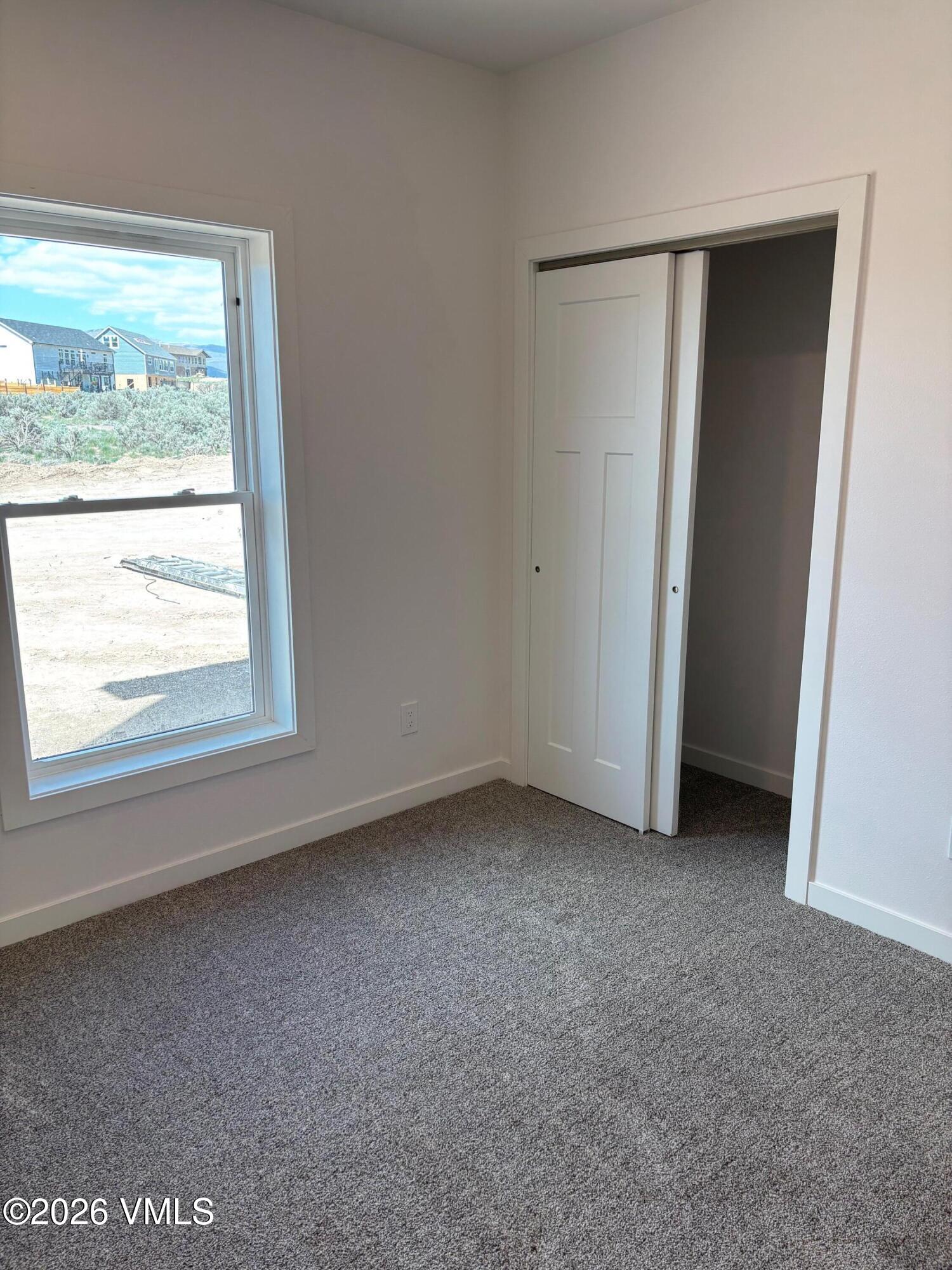 525 Blackhawk Road Gypsum, CO 81637 - Photo 22 of 23 an empty room with a window