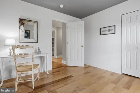 a view of a livingroom with furniture and wooden floor