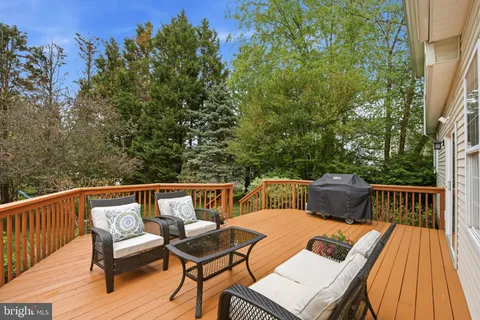 a view of a patio with wooden floor
