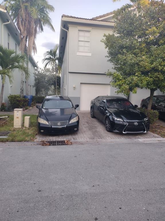 a car parked in front of a house