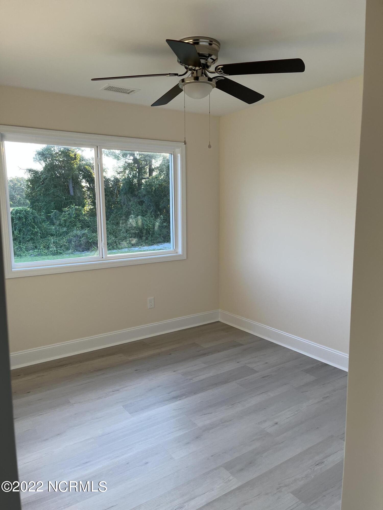 2036 Sloop Point Loop Road, Unit A5 Hampstead, NC 28443 - Photo 6 of 6 Second Bedroom