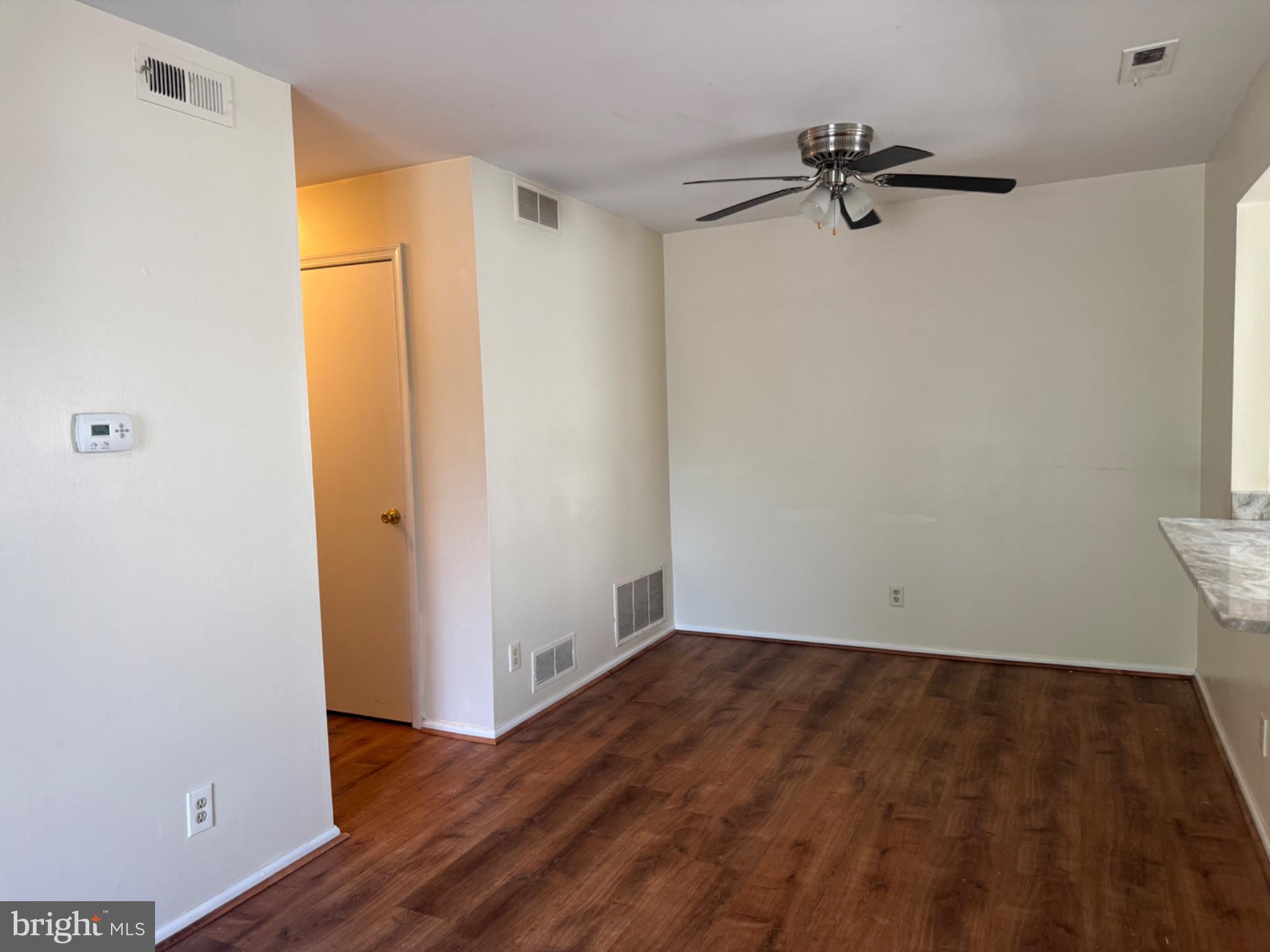 1908 B Ralston Drive Mount Laurel, NJ 08054 - Photo 7 of 21 a view of empty room with wooden floor and fan
