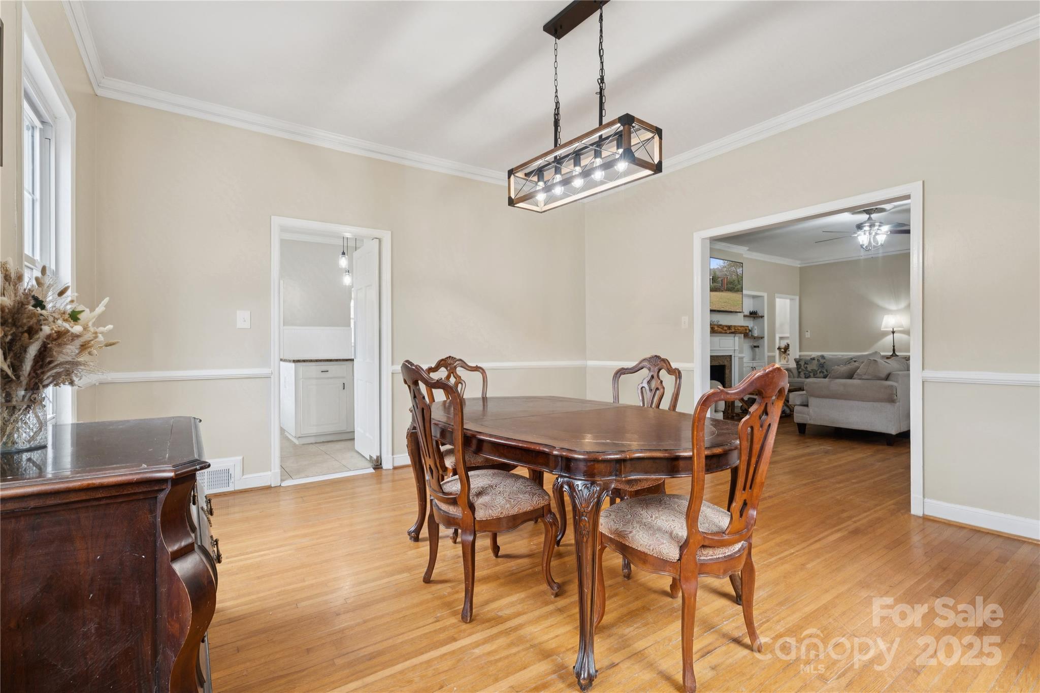 514 West Barr Street Lancaster, SC 29720 - Photo 11 of 36 a view of a dining room with furniture and wooden floor