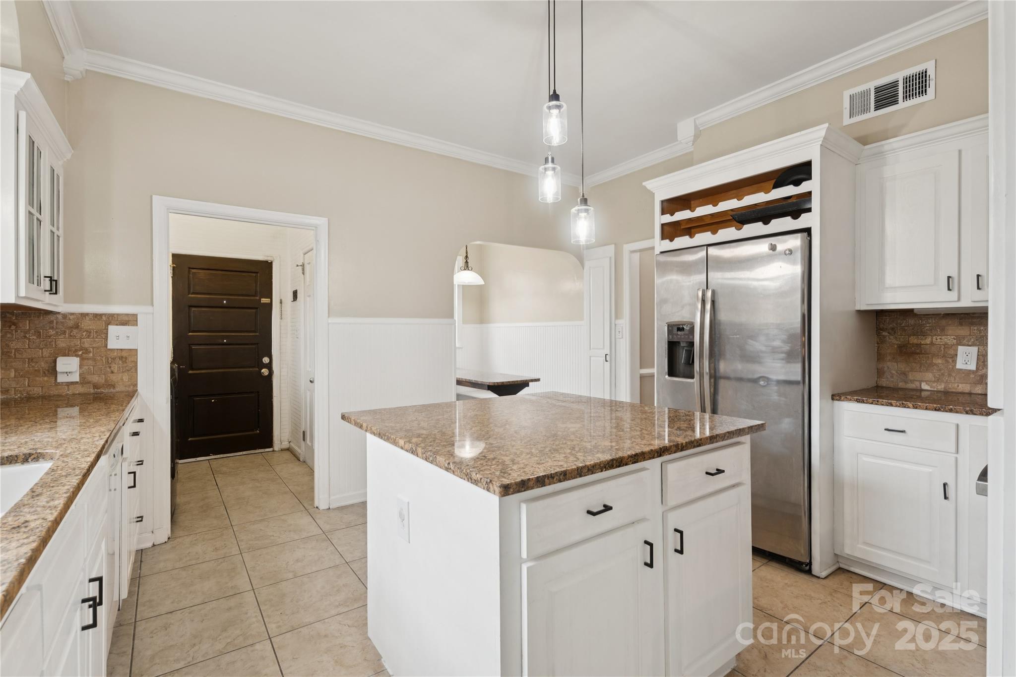 514 West Barr Street Lancaster, SC 29720 - Photo 15 of 36 a kitchen with stainless steel appliances granite countertop a refrigerator and a sink