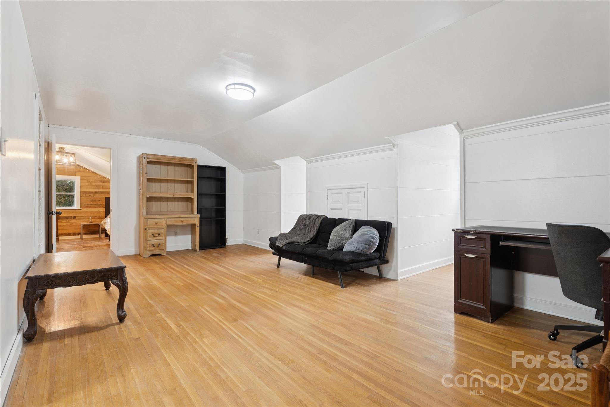 514 West Barr Street Lancaster, SC 29720 - Photo 27 of 36 a bedroom with a bed and cabinets