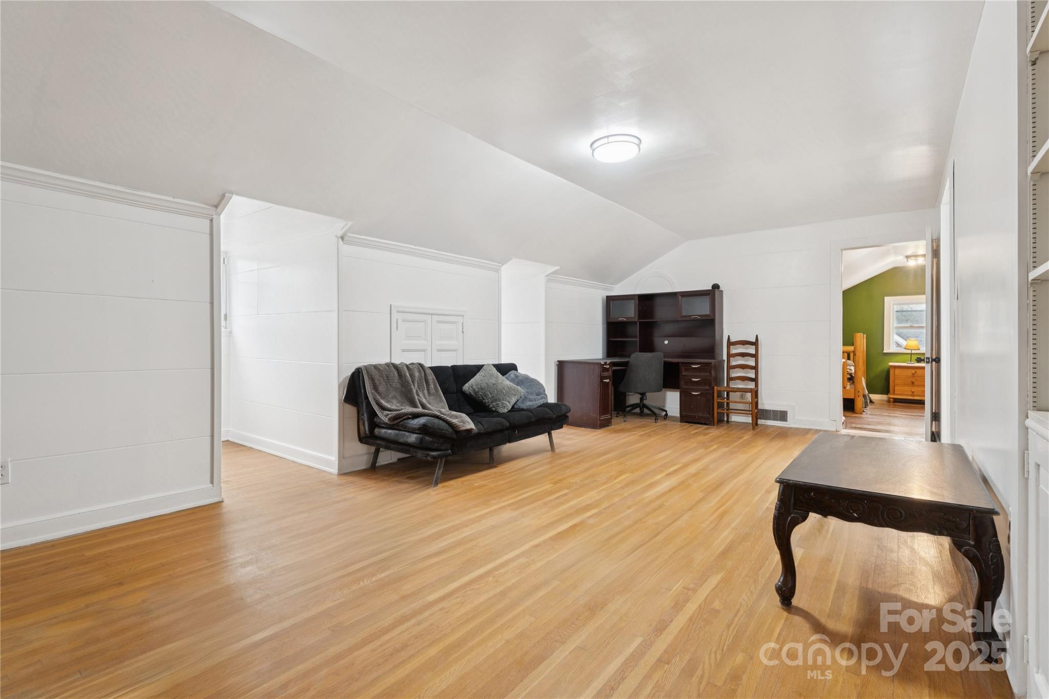 514 West Barr Street Lancaster, SC 29720 - Photo 28 of 36 a living room with furniture and a flat screen tv