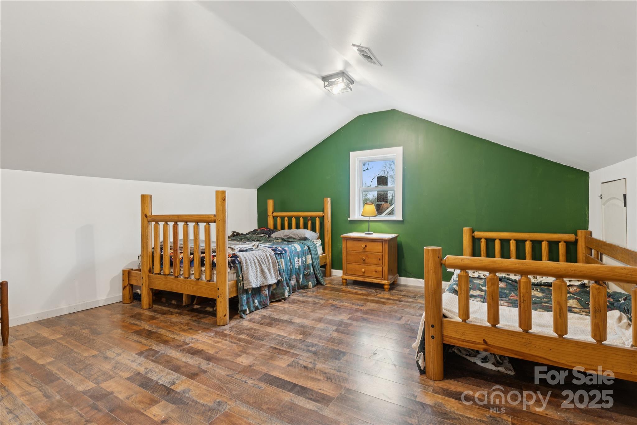 514 West Barr Street Lancaster, SC 29720 - Photo 31 of 36 a bedroom with furniture and a window