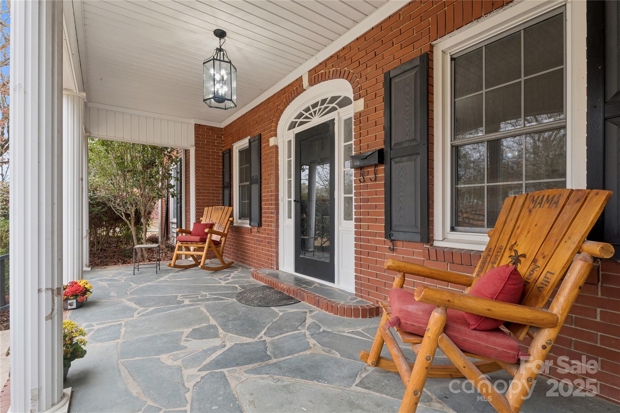 514 West Barr Street Lancaster, SC 29720 - Photo 6 of 36 a view of a chairs with a porch