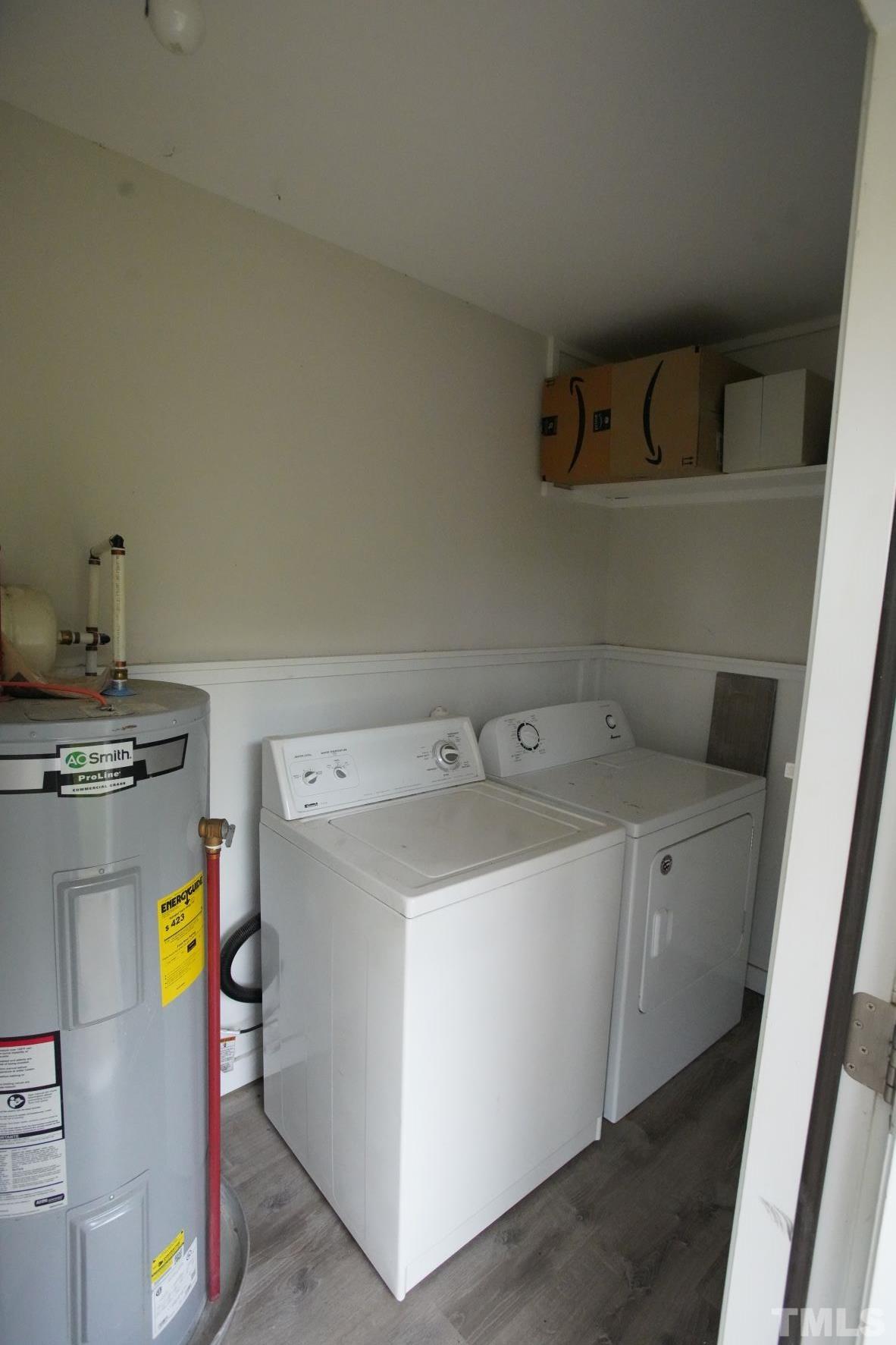 1206 Downing Road Raleigh, NC 27610 - Photo 12 of 15 a utility room with dryer and washer