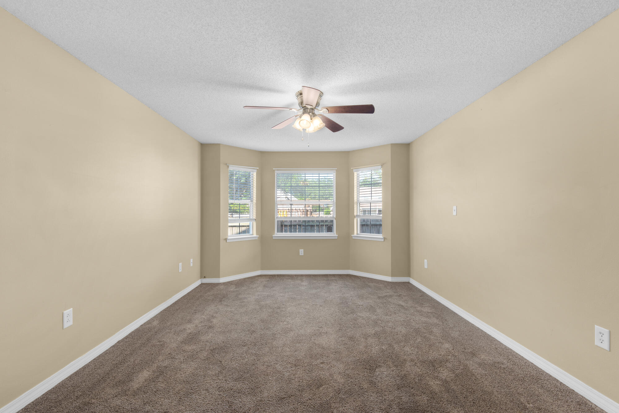 880 Brande Court Shalimar, FL 32579 - Photo 21 of 57 a view of an empty room with a window