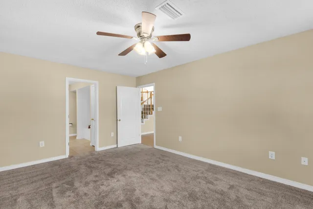 a bathroom with a double vanity sink mirror and