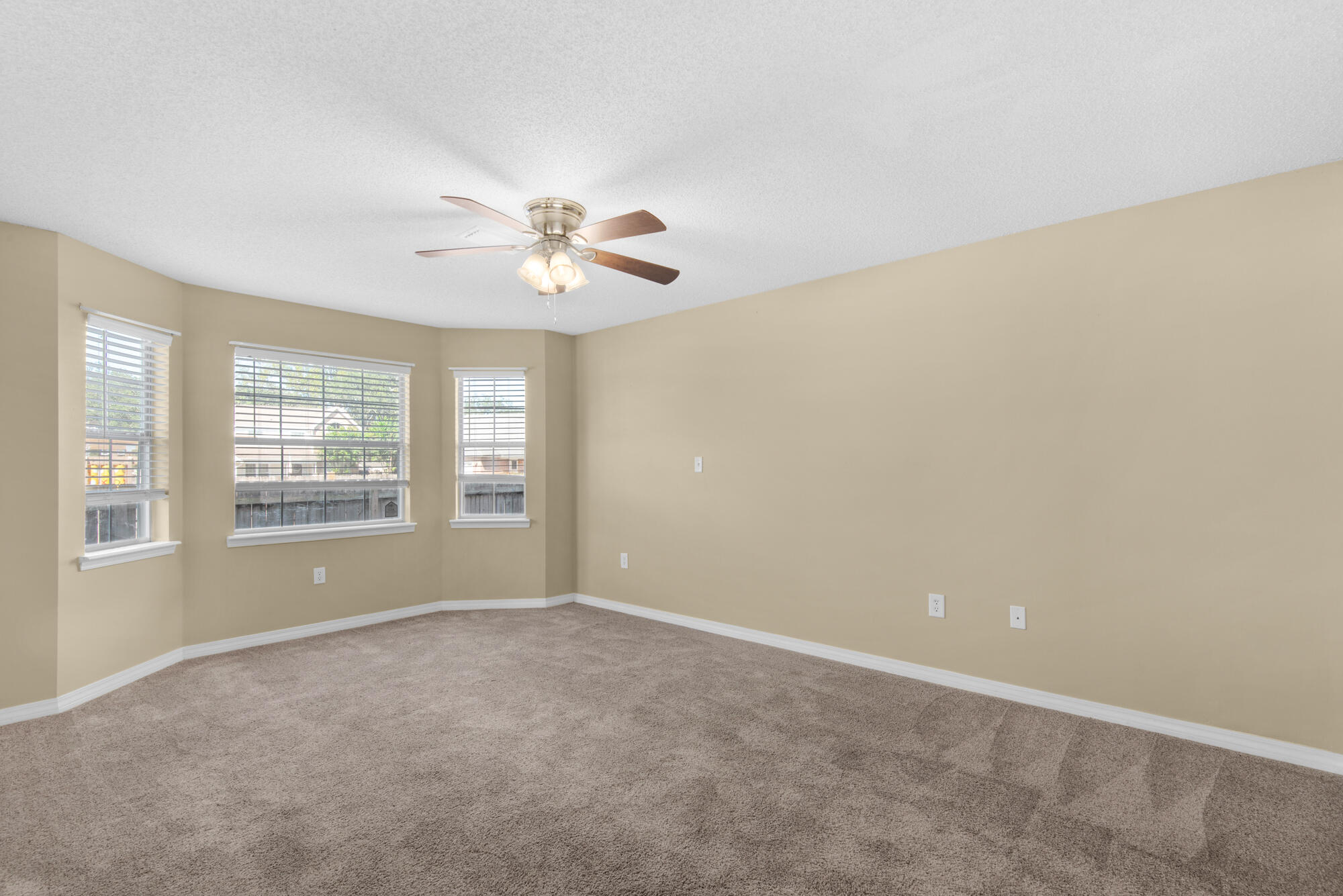 880 Brande Court Shalimar, FL 32579 - Photo 23 of 57 a view of an empty room with a window