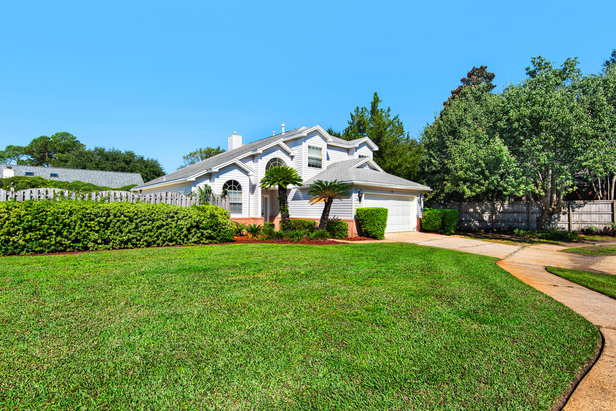 880 Brande Court Shalimar, FL 32579 - Photo 3 of 57 a aerial view of a house with a yard table and chairs