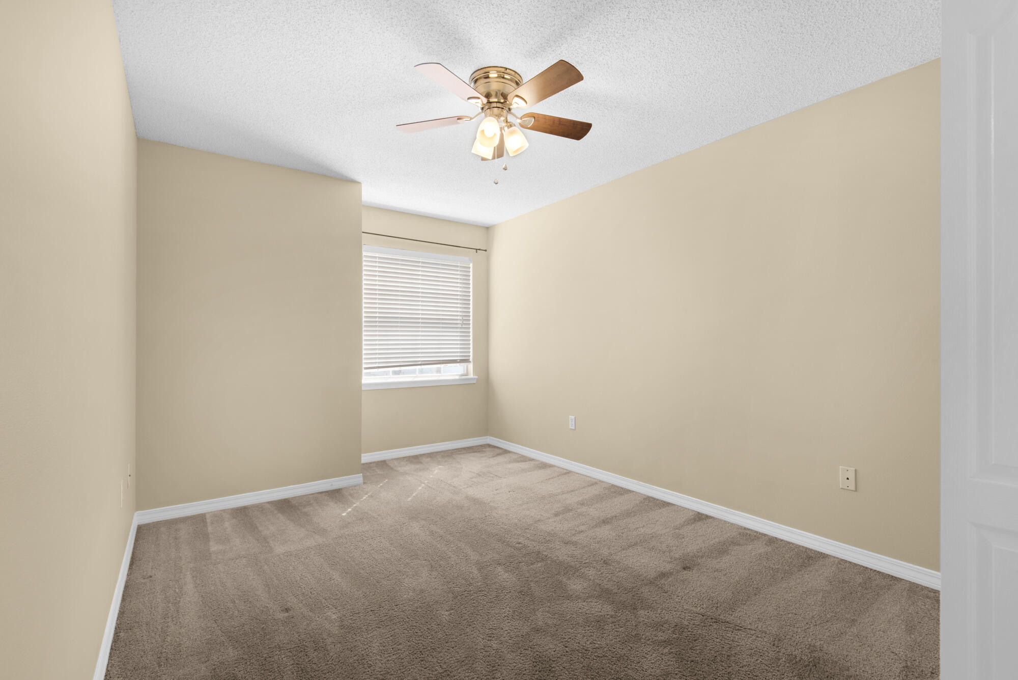880 Brande Court Shalimar, FL 32579 - Photo 32 of 57 a view of an empty room with a window