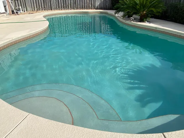 a balcony with view of wooden floor