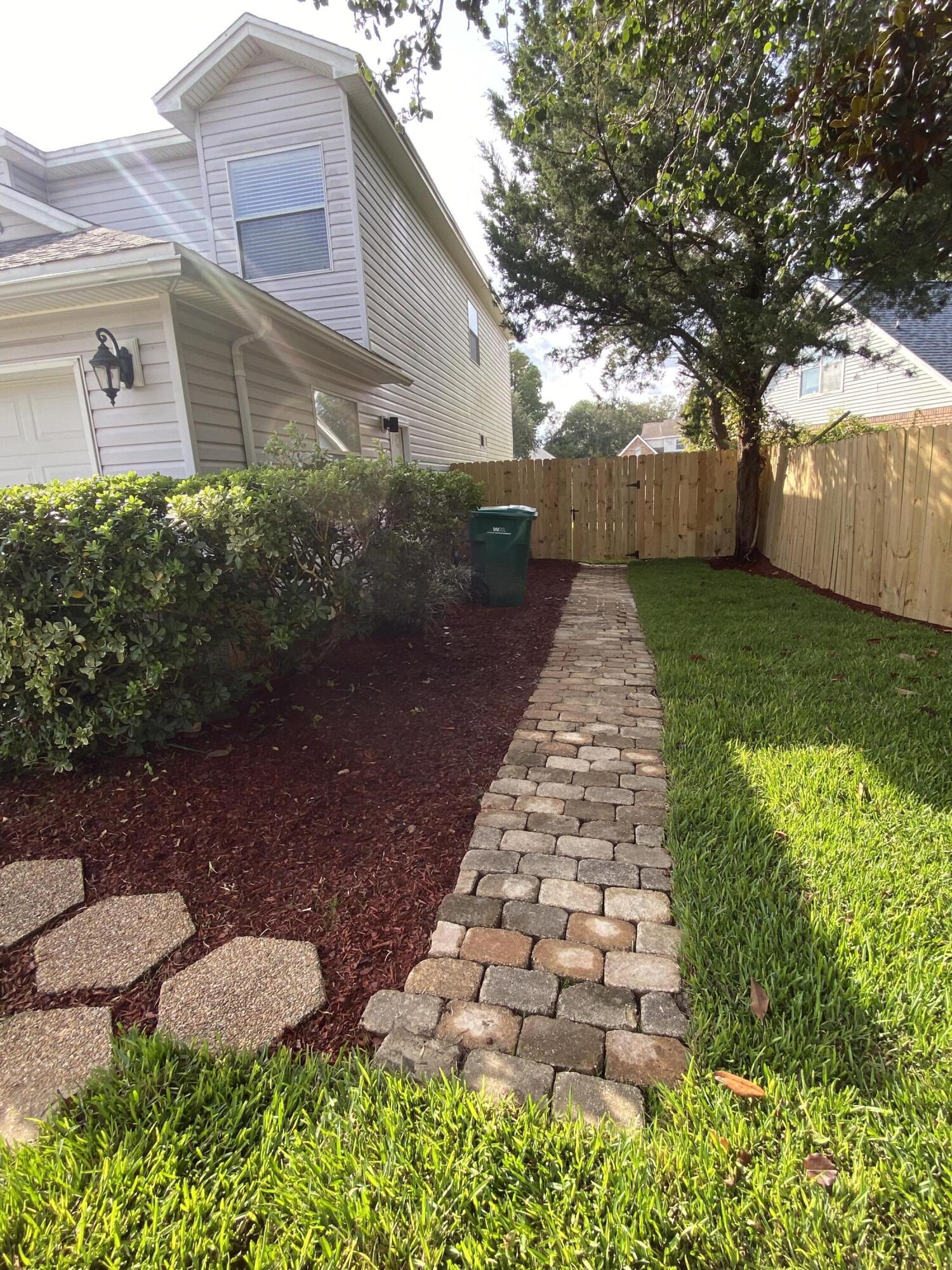880 Brande Court Shalimar, FL 32579 - Photo 53 of 57 a front view of a house with garden