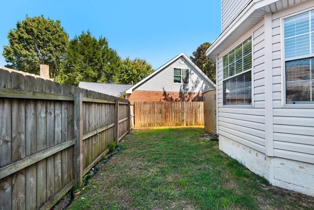 a view of a hallway with a white walls