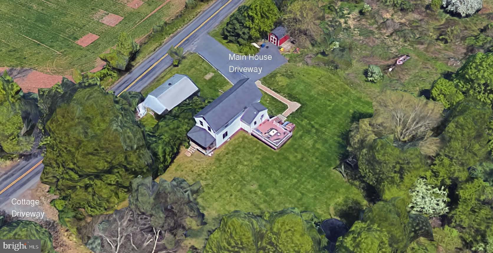 Separate Cottage driveway noted