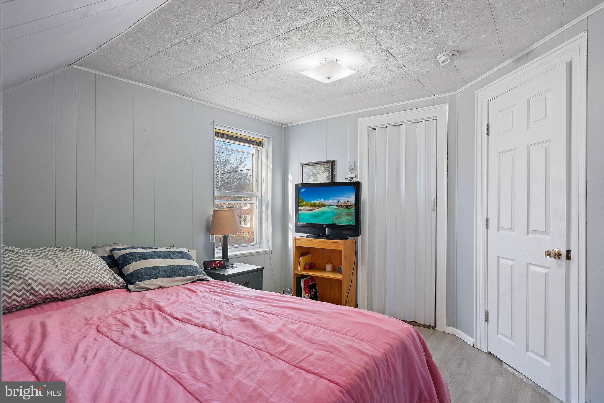 2907 North Constitution Road Camden, NJ 08104 - Photo 26 of 30 a bedroom with a bed and a closet