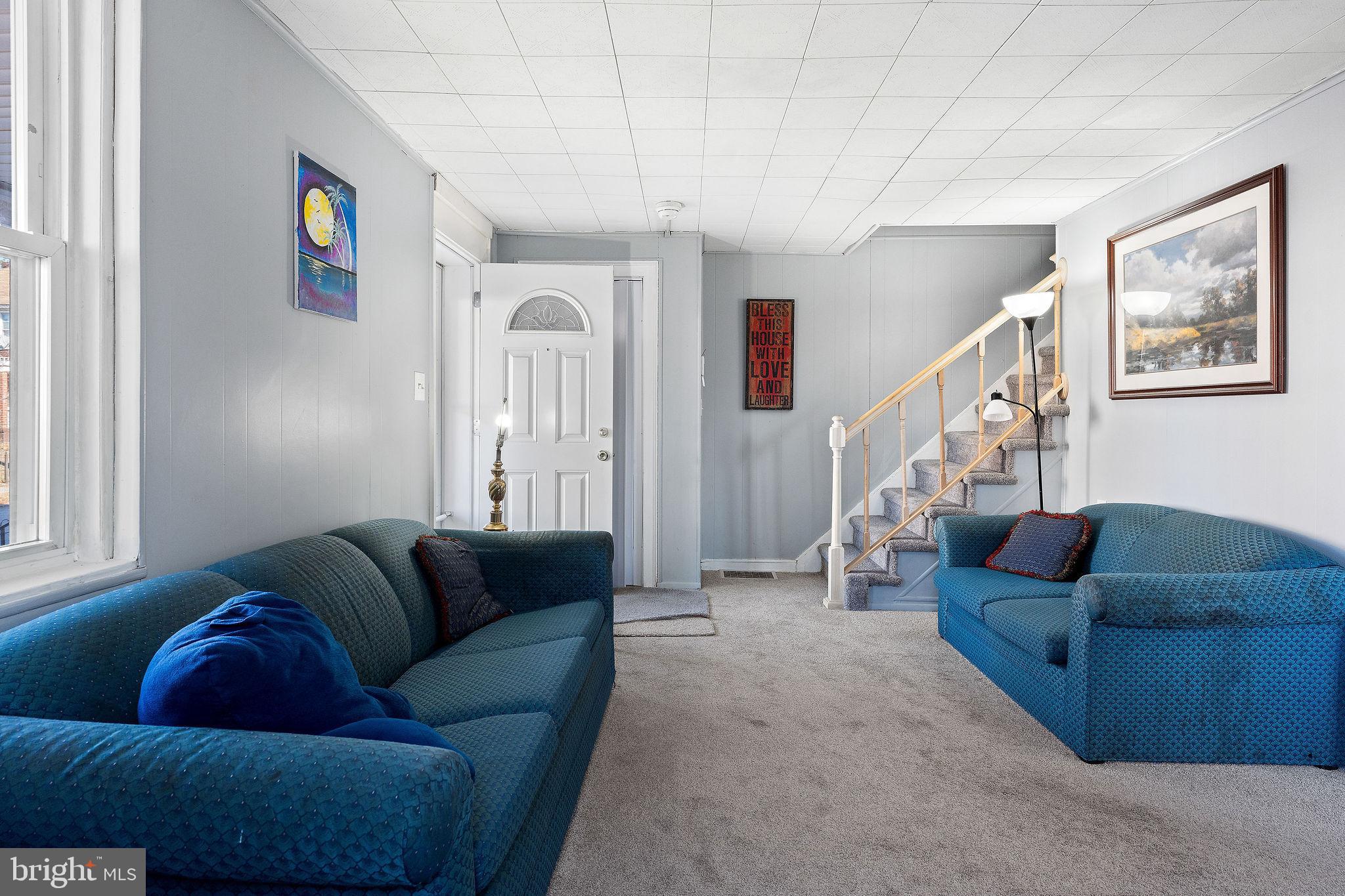 2907 North Constitution Road Camden, NJ 08104 - Photo 6 of 30 a living room with furniture and a couch