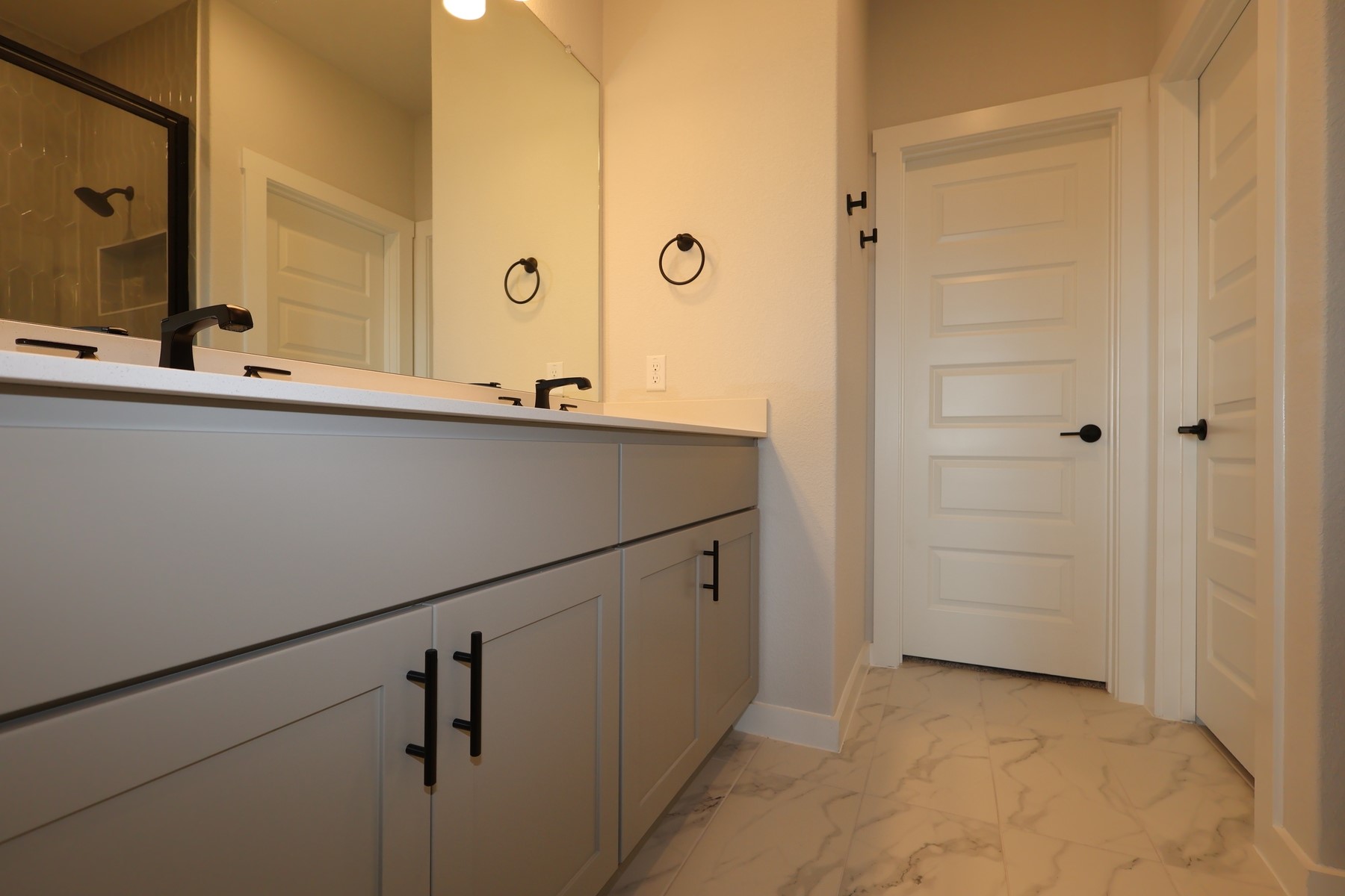 304 Emerie Way Georgetown, TX 78626 - Photo 10 of 15 a bathroom with a sink and mirror